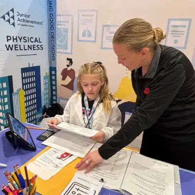 Volunteer helping a student